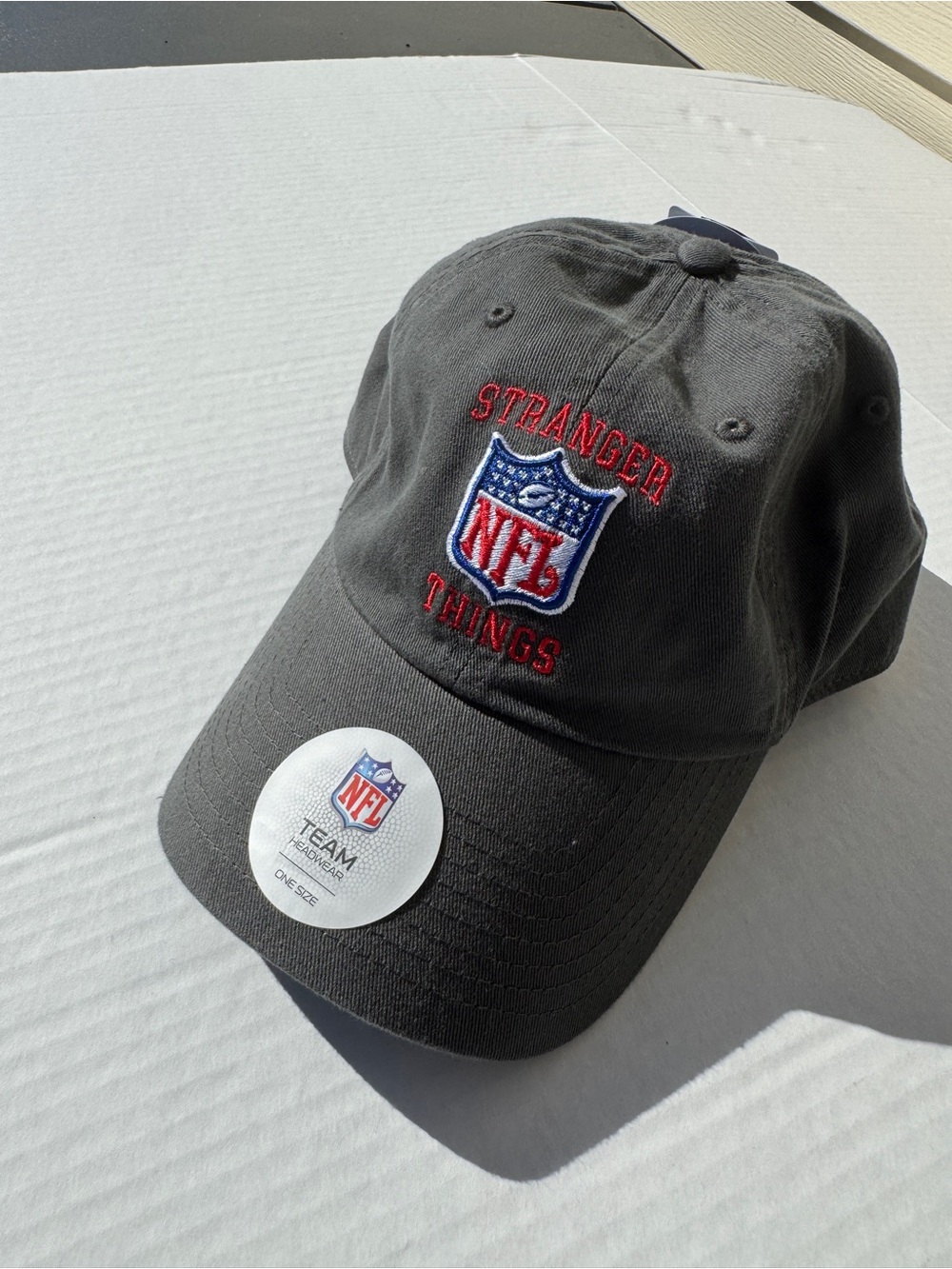 NFL Team Headwear Stranger Things NFL Shield Gray Embroidered strap back Hat OS
